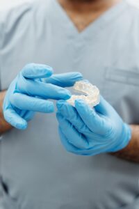 Clear aligner over mold of a mouth